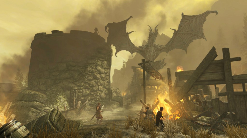 Scene from Skyrim. Alduin, a massive black dragon, flies over a town as it burns, and the people run in panic.